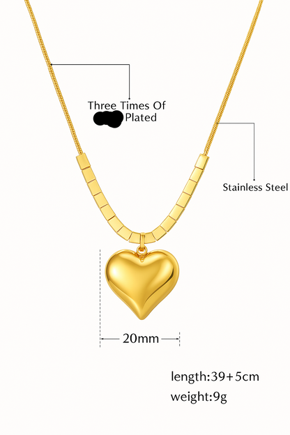 Gold heart-shaped pendant necklace with specifications on a white background